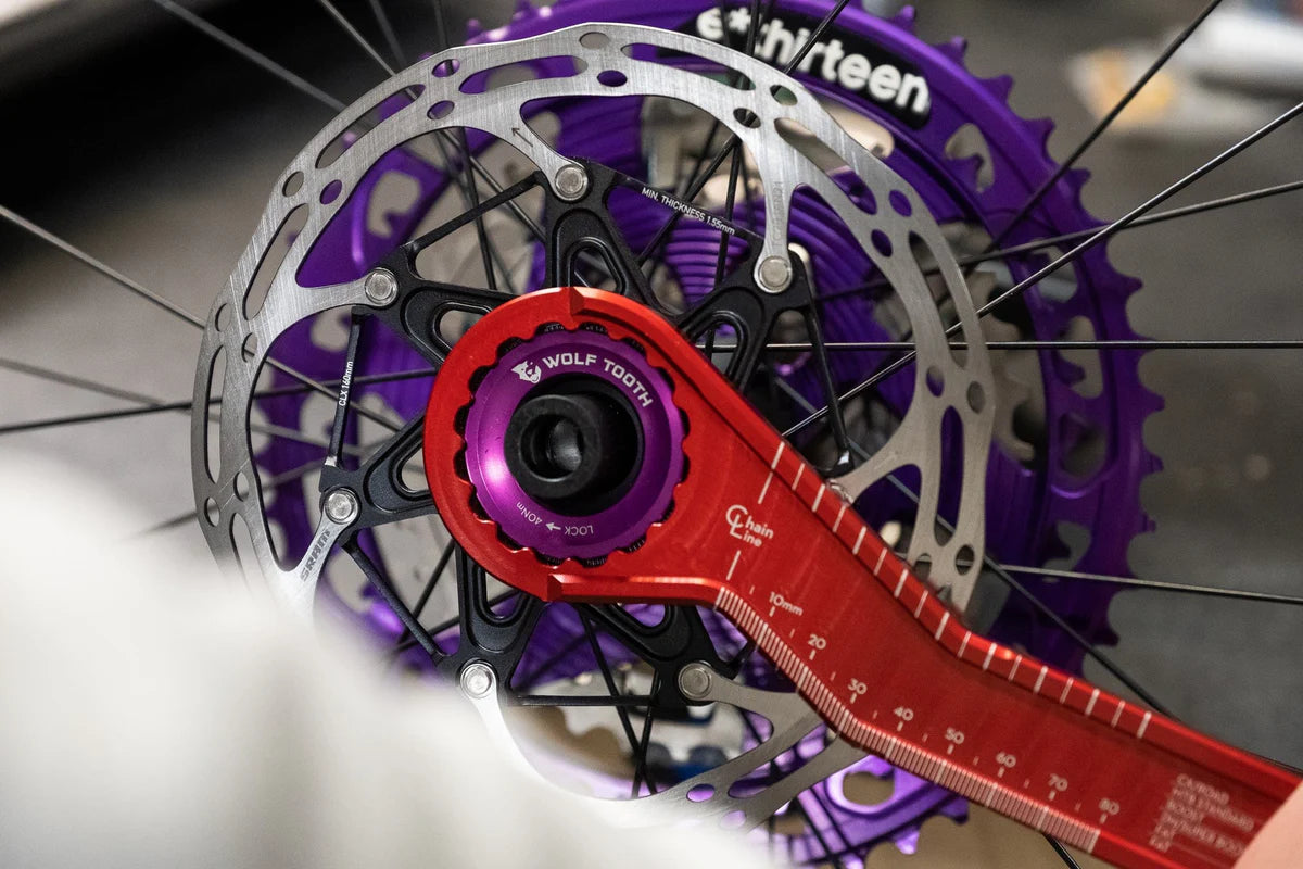 WOLF TOOTH Centerlock-moer (extern), goudkleurig